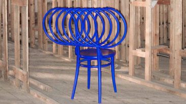 O design escultural da cadeira homenageia um clássico centenário de madeira